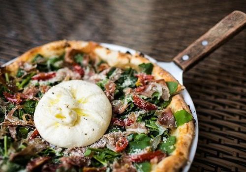 Nhận được khoản vay từ đối tác, Pizza 4P’s giảm huy động vốn từ trái phiếu
